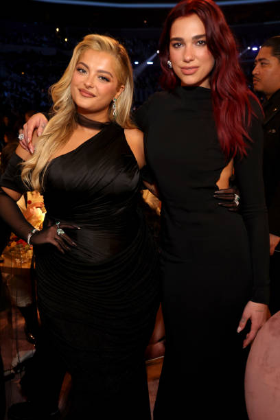 Bebe Rexha and Dua Lipa attend the 66th GRAMMY Awards at Crypto.com Arena on February 04, 2024 in Los Angeles, California — frame 54/80 (408×612)