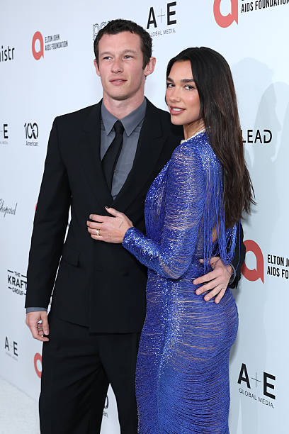 Callum Turner and Dua Lipa attend Elton John AIDS Foundation's 34th Annual Academy Awards Viewing Party on March 15, ...
