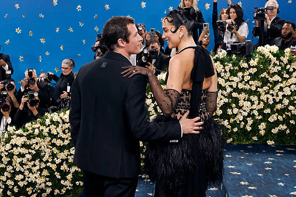 Callum Turner and Dua Lipa Attend Superfine Tailor