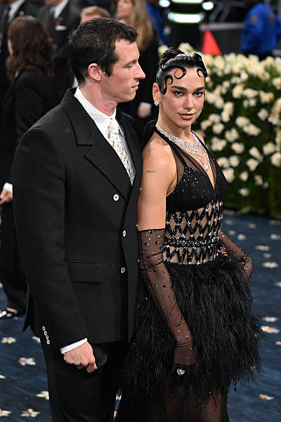 Callum Turner and Dua Lipa Attending the Metropoli