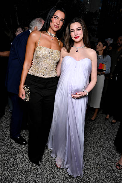 Dua Lipa and Anne Hathaway at the Bvlgari Serpenti
