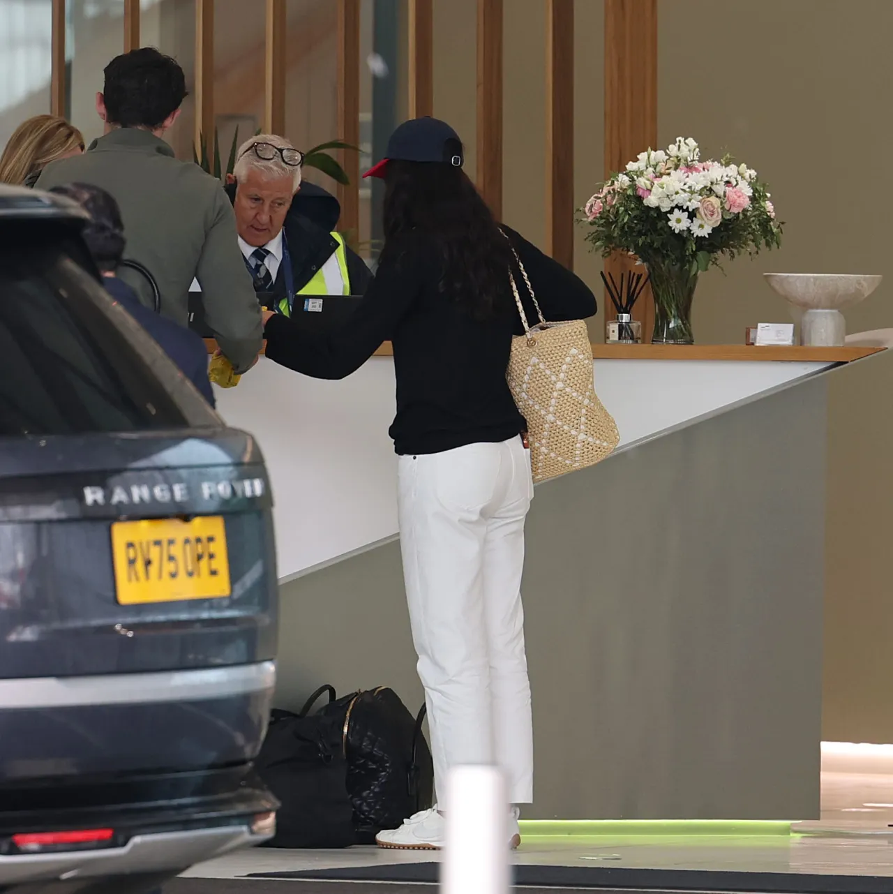 Dua Lipa and Callum Turner at London Airport June