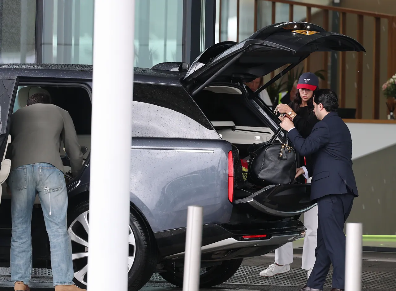 Dua Lipa and Callum Turner at London Airport June
