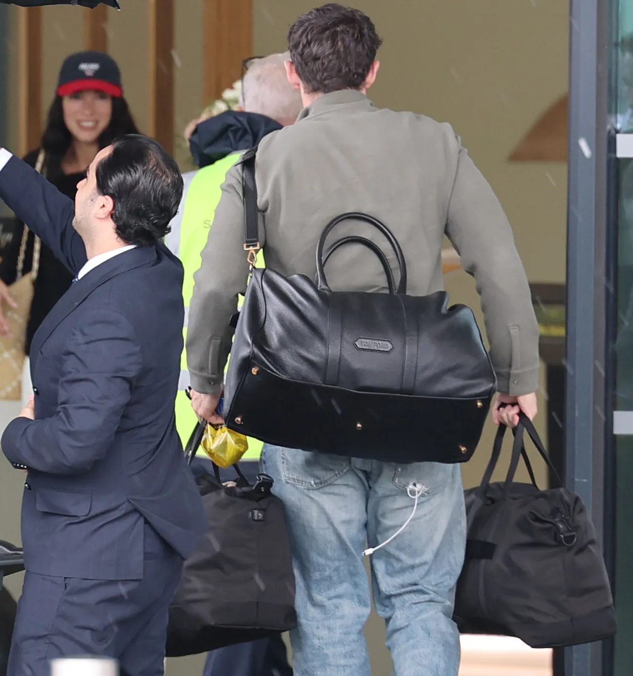 Dua Lipa and Callum Turner at London Airport June