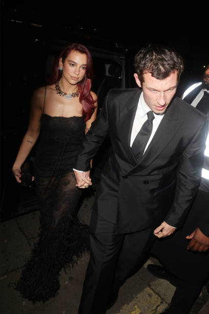 Dua Lipa and Callum Turner Attend the British Vogu
