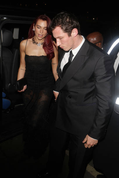Dua Lipa and Callum Turner Attend the British Vogu