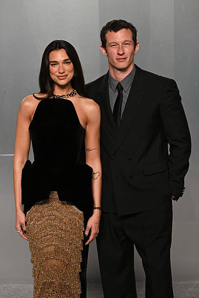 Dua Lipa and Callum Turner attend the Vanity Fair Oscar Party held at Los Angeles County Museum of Art in Beverly Hills, Los Angeles, California, USA. Picture date: Sunday March 15, 2026 — frame 99/107 (408×612)