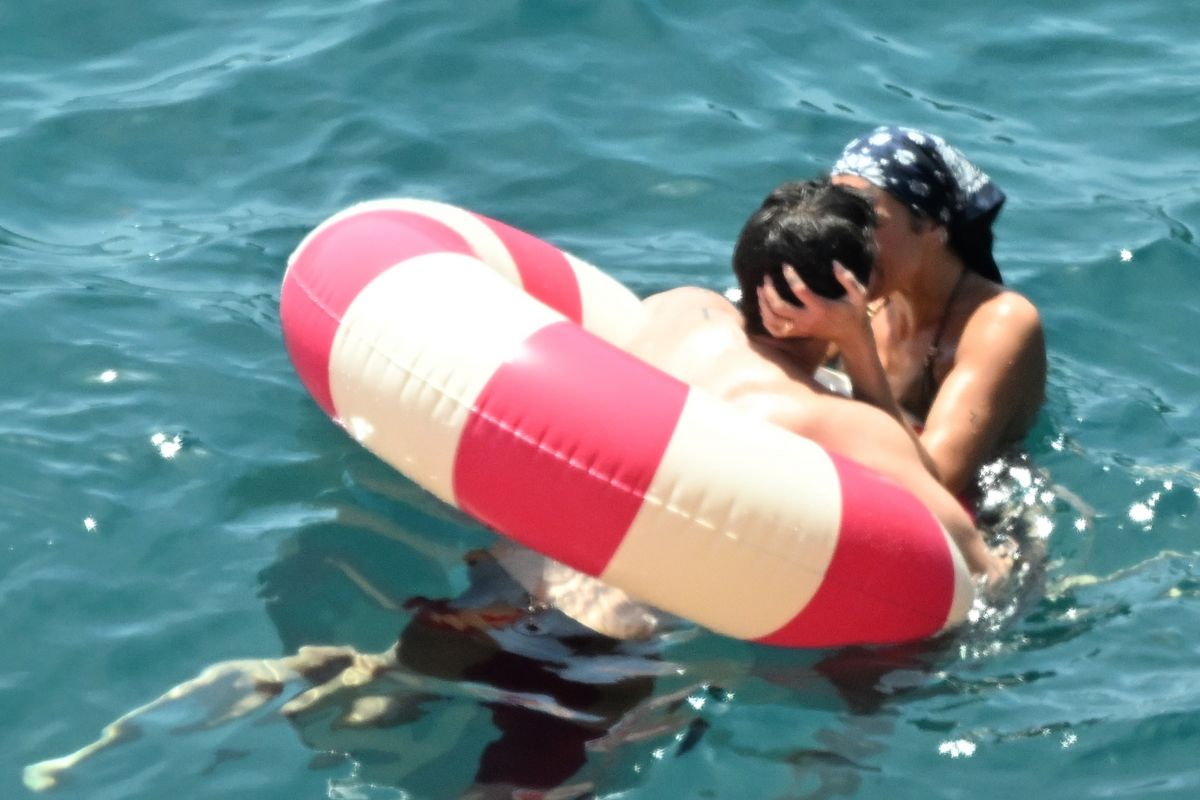 Dua Lipa and Callum Turner on the Sea in a Float