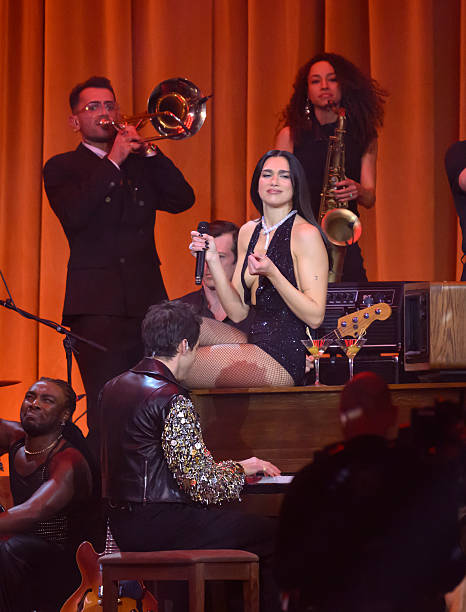 Dua Lipa and Mark Ronson Perform on Stage During