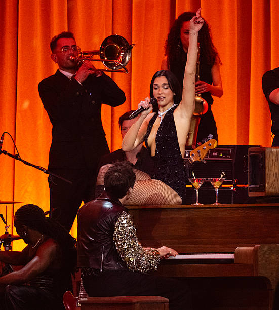 Dua Lipa and Mark Ronson Perform on Stage During
