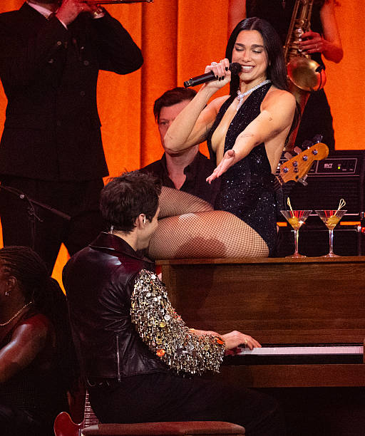 Dua Lipa and Mark Ronson Perform on Stage During