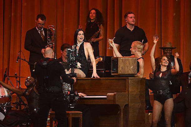 Dua Lipa and Mark Ronson Perform on Stage During (612×408)