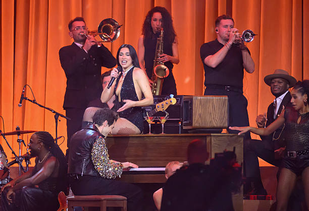 Dua Lipa and Mark Ronson Perform on Stage During