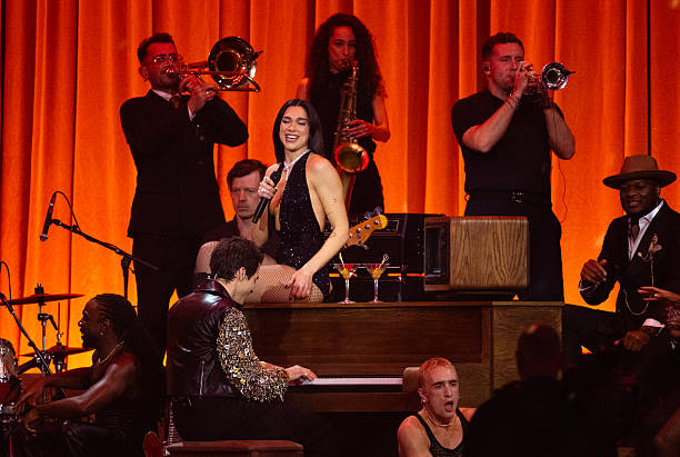Dua Lipa and Mark Ronson Perform on Stage During