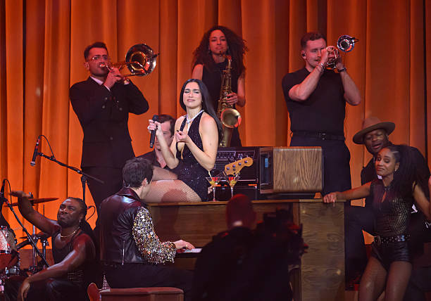 Dua Lipa and Mark Ronson Perform on Stage During