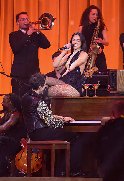 Dua Lipa and Mark Ronson Perform on Stage During