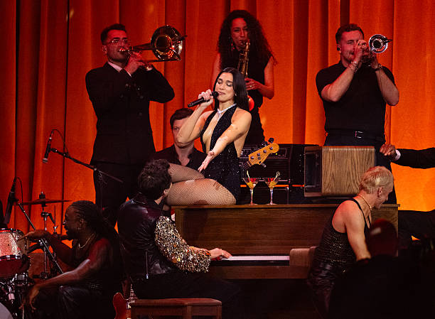 Dua Lipa and Mark Ronson Perform on Stage During