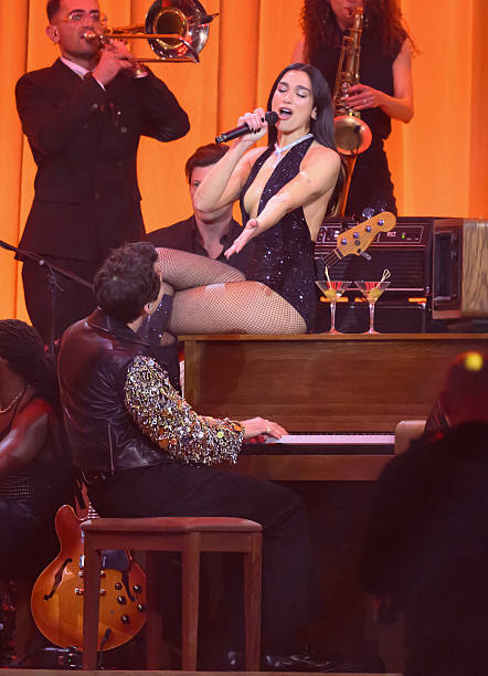 Dua Lipa and Mark Ronson Perform on Stage During
