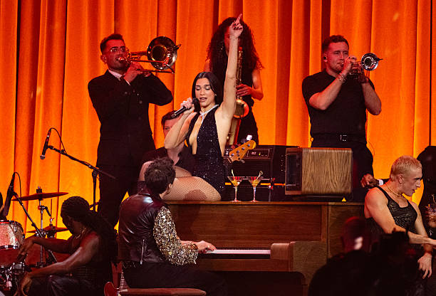 Dua Lipa and Mark Ronson Perform on Stage During