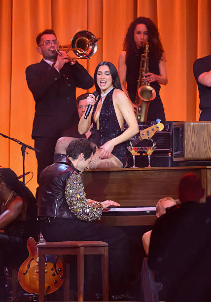 Dua Lipa and Mark Ronson Perform on Stage During