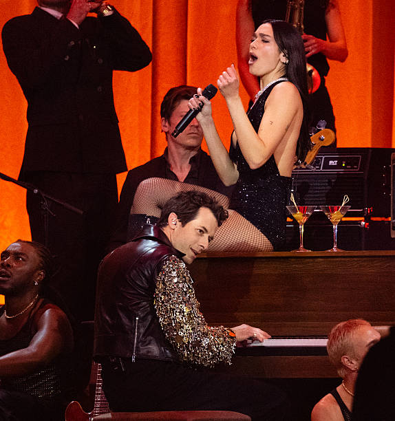 Dua Lipa and Mark Ronson Perform on Stage During