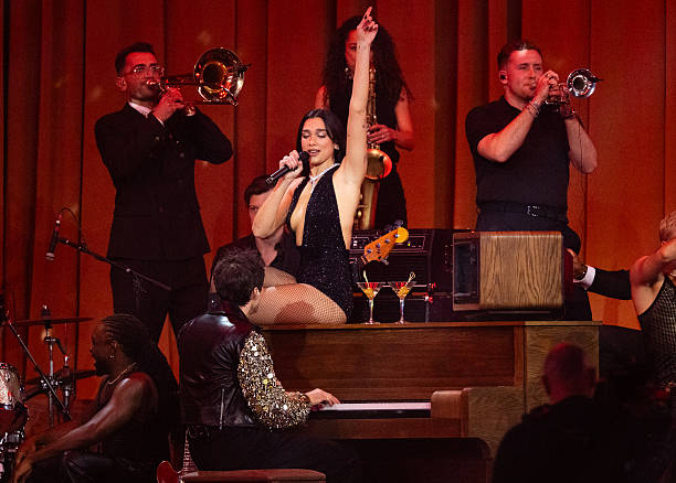 Dua Lipa and Mark Ronson Perform on Stage During