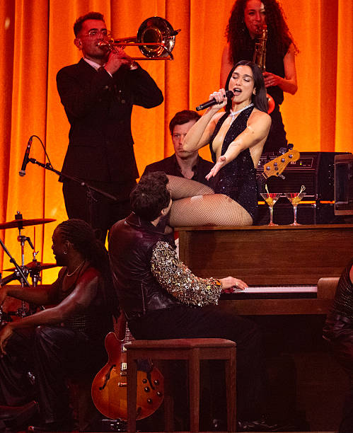 Dua Lipa and Mark Ronson Perform on Stage During