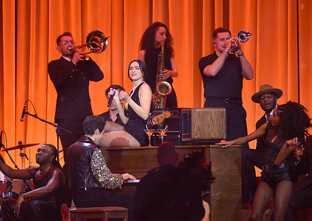 Dua Lipa and Mark Ronson Perform on Stage During