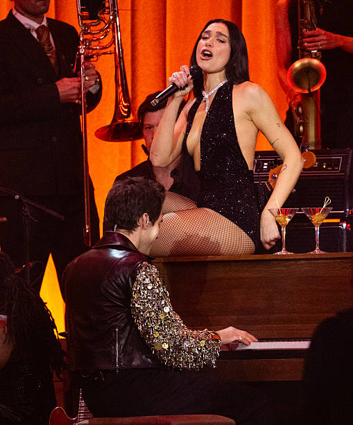 Dua Lipa and Mark Ronson Perform on Stage During