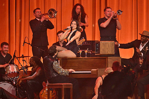 Dua Lipa and Mark Ronson Perform on Stage During