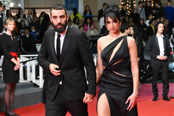 Dua Lipa and Romain Gavras attend the "Omar La Fraise " red carpet during the 76th annual Cannes film festival at Palais des Festivals on May 19, 2023 in Cannes, France (612×408)