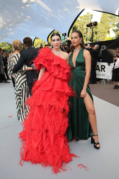Dua Lipa and Sarah Lysander Attend the Amfar Canne (408×612)