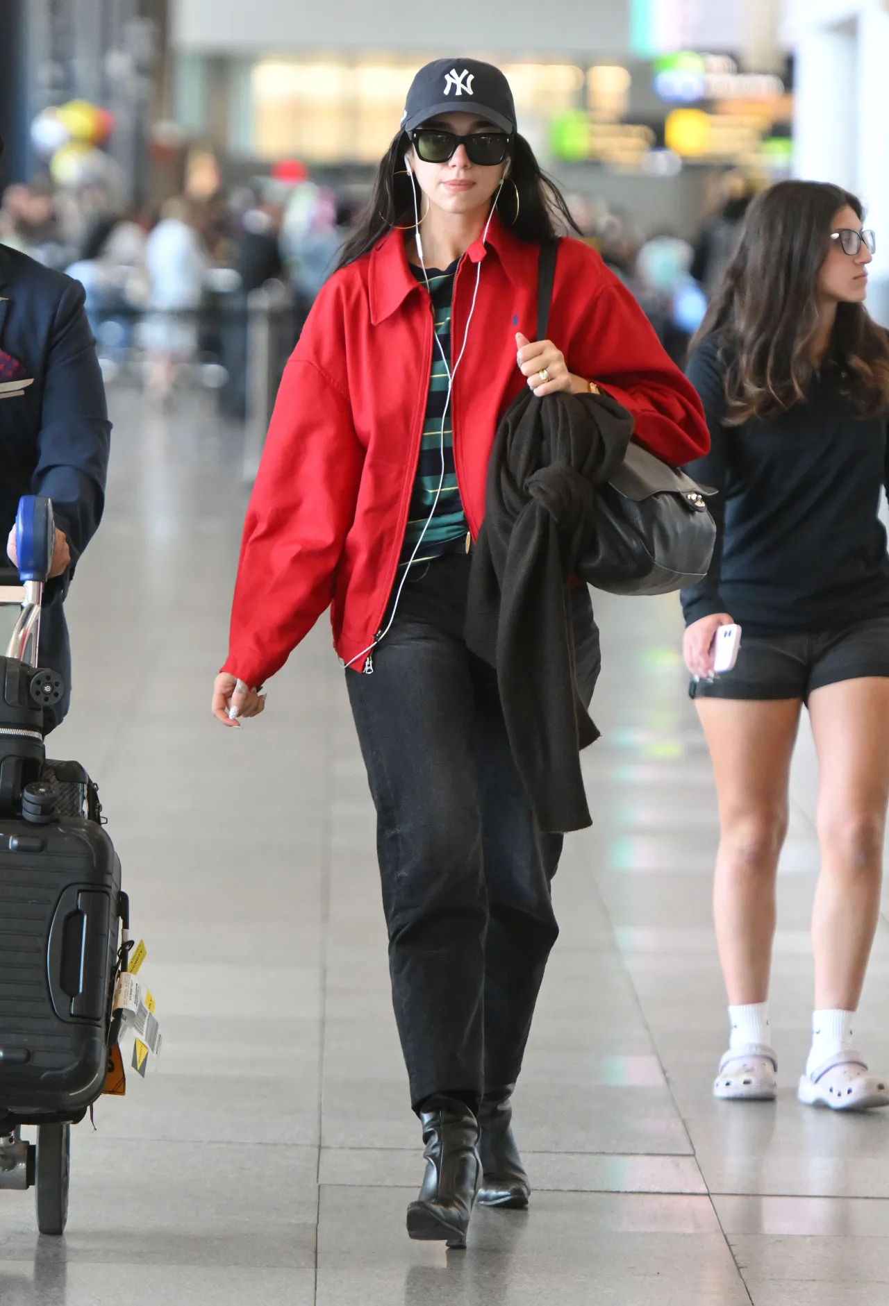 Dua Lipa Arrives at Jfk in a Red Jacket August