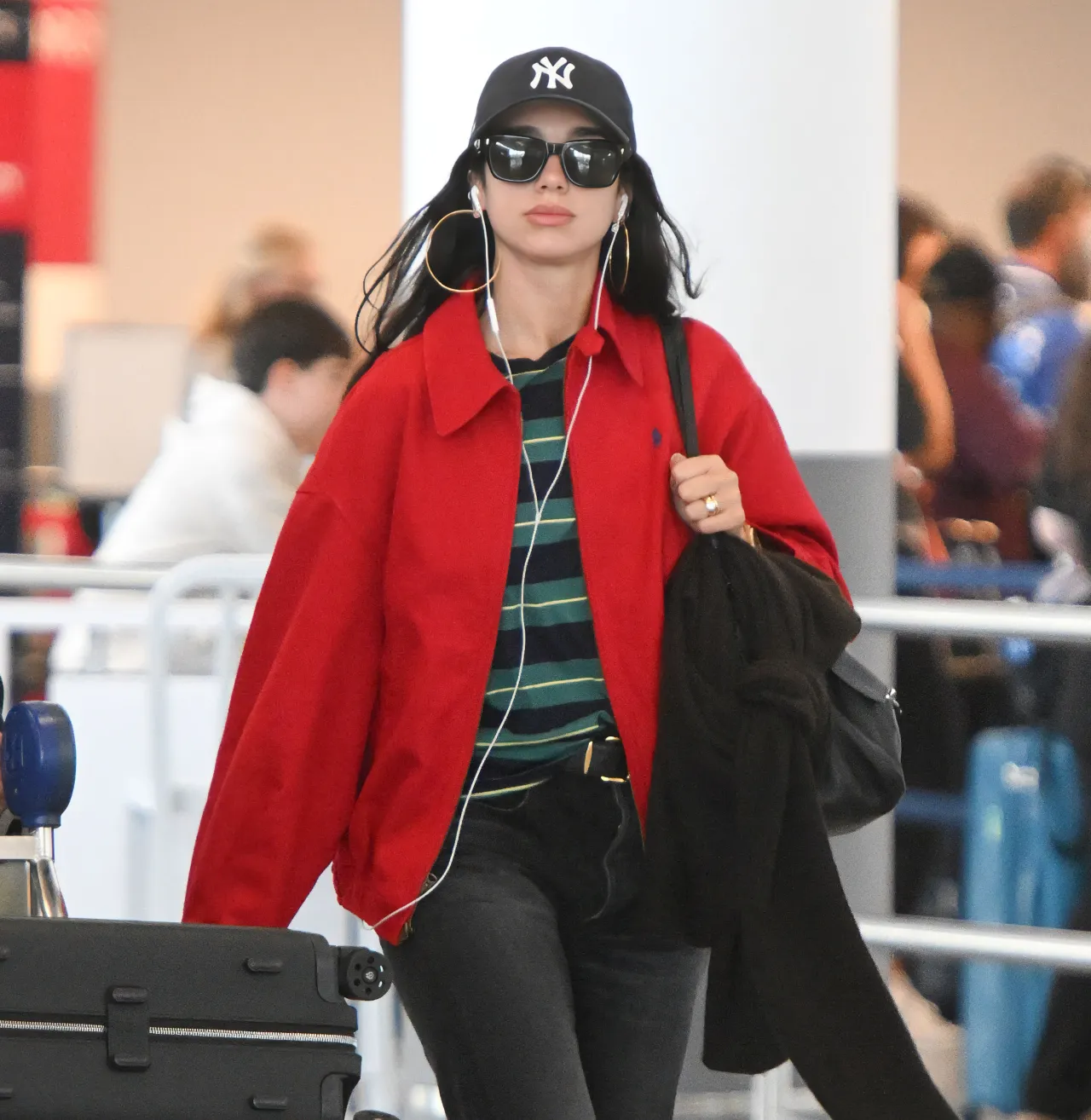 Dua Lipa Arrives at Jfk in a Red Jacket August