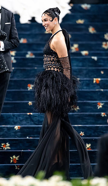 Dua Lipa Arrives to the 2025 Met Gala Celebrating