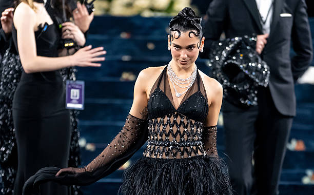 Dua Lipa Arrives to the 2025 Met Gala Celebrating