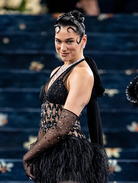 Dua Lipa Arrives to the 2025 Met Gala Celebrating