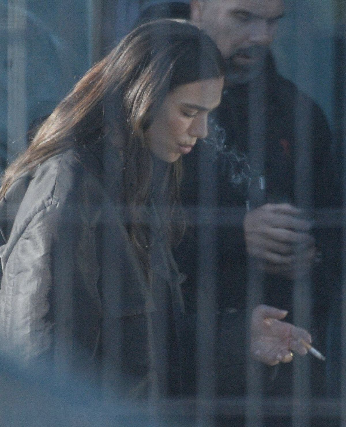 Dua Lipa at a Cigarette Break While Filming a Comm (1200×1482)