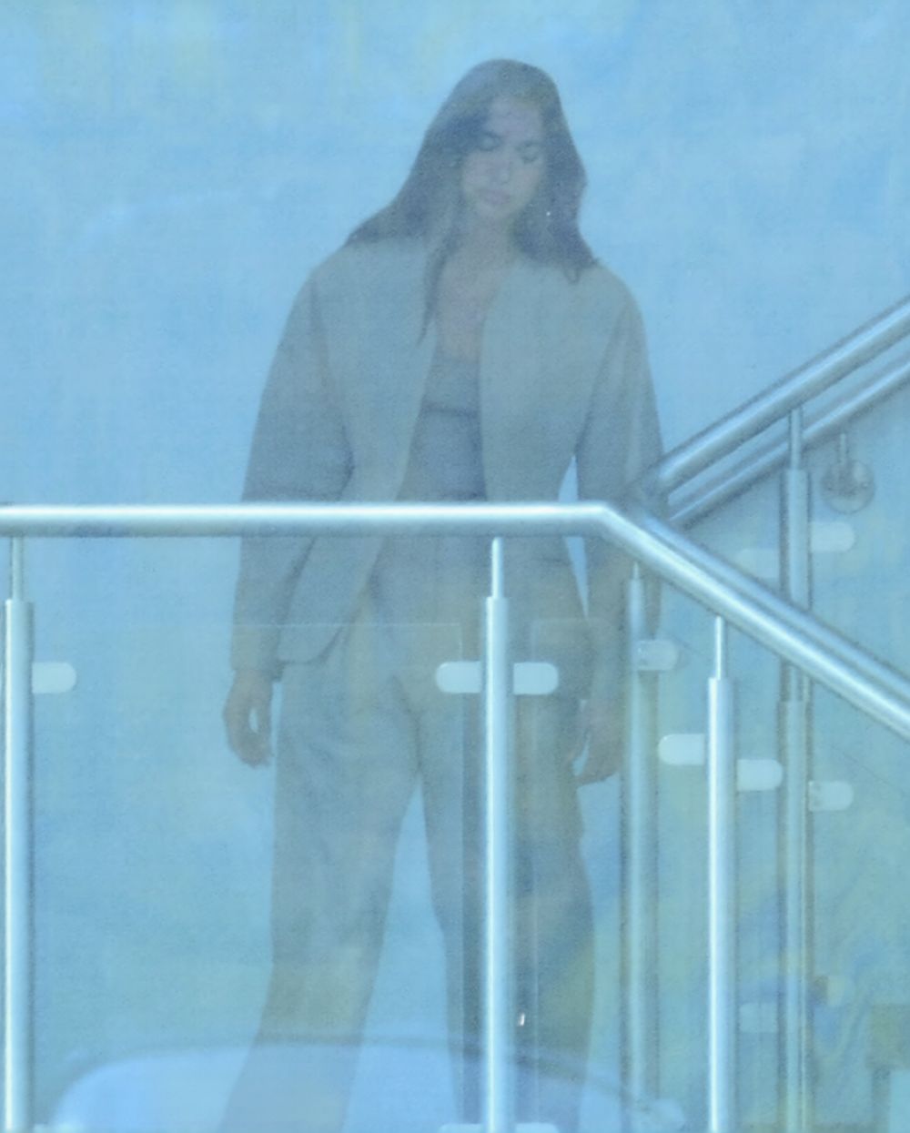 Dua Lipa at a Cigarette Break While Filming a Comm