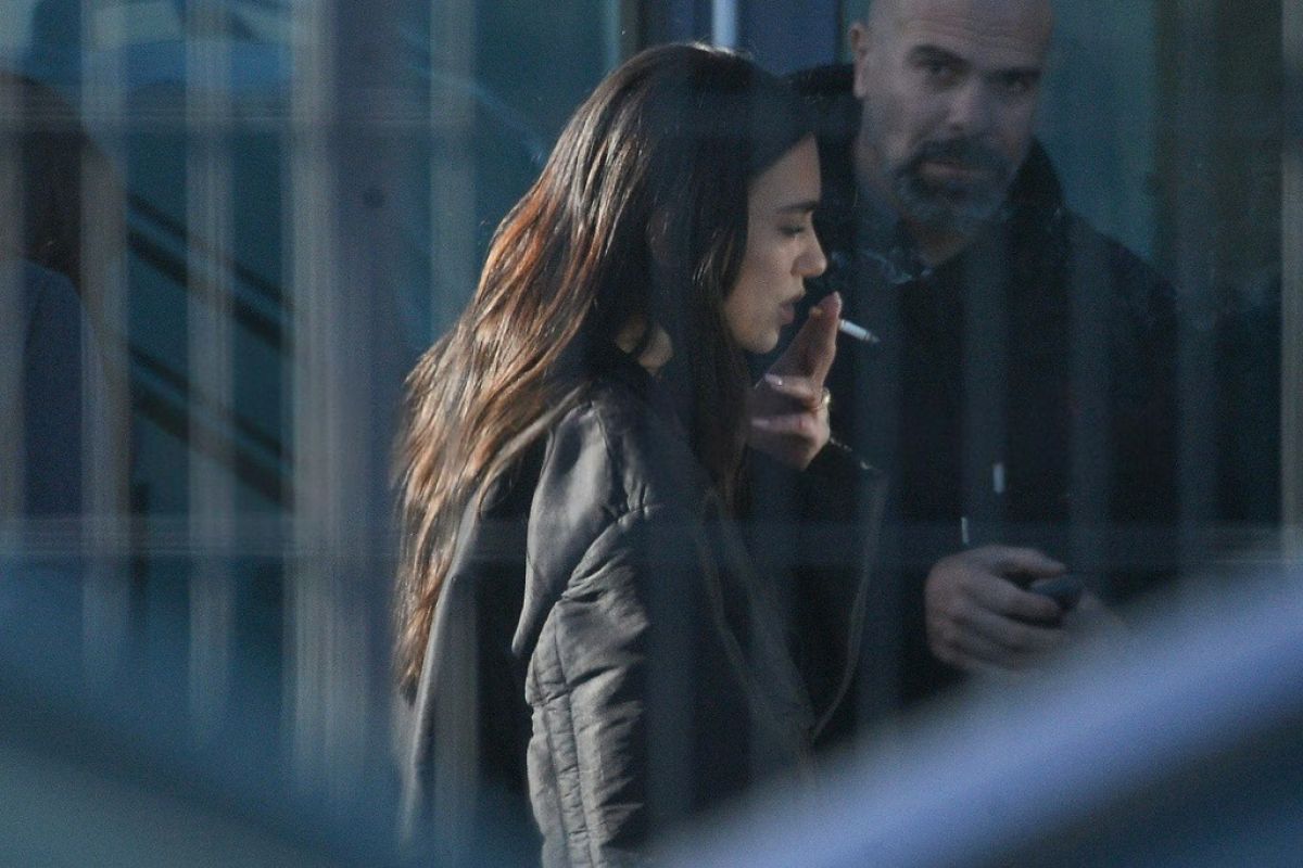Dua Lipa at a Cigarette Break While Filming a Comm