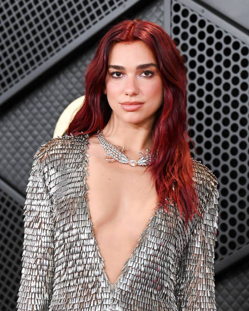 Dua Lipa at the 66th Annual GRAMMY Awards held at Crypto.com Arena on February 4, 2024 in Los Angeles, California — frame 80/80 (490×612)