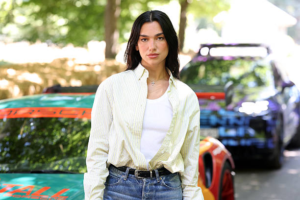 Dua Lipa at the Goodwood Festival of Speed, where she went up the world famous hillclimb today in the Dua Lipa Renstall Porsche 911 GT3 RS driven by Iron Dames racing driver Karen Gaillard at Goodwood Festival of Speed presented by Mastercard, which takes place in the parkland surrounding Goodwood House in West Sussex. Picture date: Saturday 12, 2025.