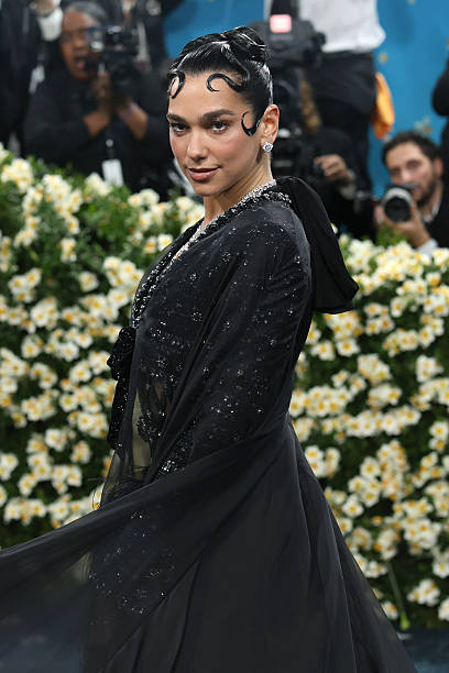 Dua Lipa Attends 2025 Met Gala Celebrating Superfi