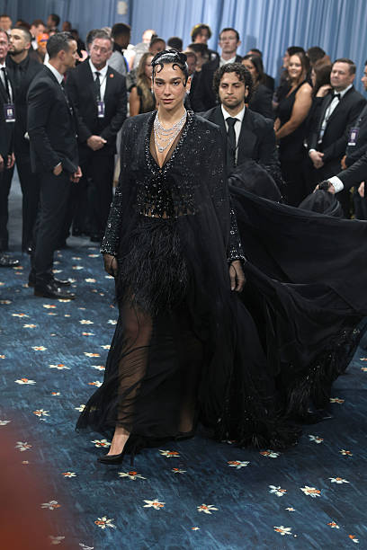 Dua Lipa Attends 2025 Met Gala Celebrating Superfi