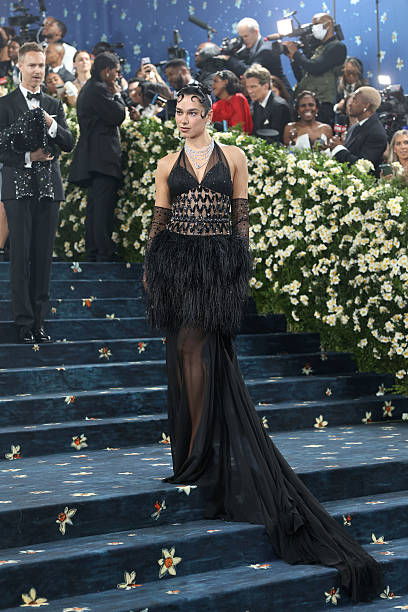 Dua Lipa Attends 2025 Met Gala Celebrating Superfi