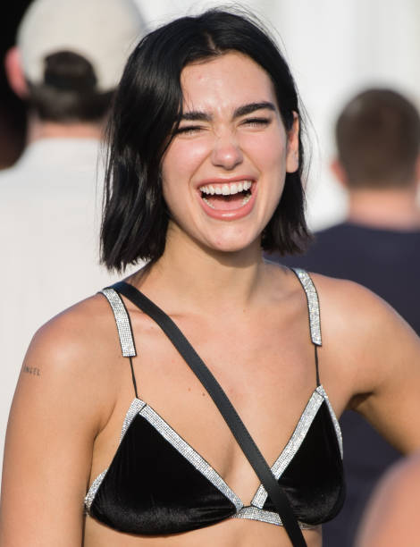 Dua Lipa Attends Day Three of Glastonbury Festival