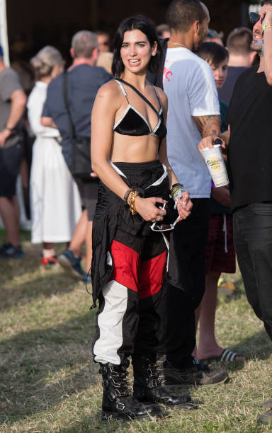 Dua Lipa Attends Day Three of Glastonbury Festival