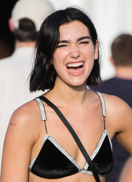 Dua Lipa Attends Day Three of Glastonbury Festival