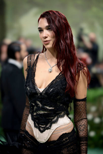 Dua Lipa Attends the 2024 Met Gala Celebrating Sle
