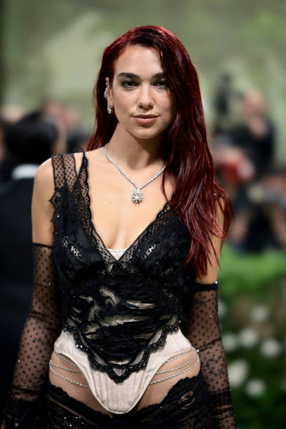 Dua Lipa attends The 2024 Met Gala Celebrating "Sleeping Beauties: Reawakening Fashion" at The Metropolitan Museum of Art on May 06, 2024 in New York City — frame 8/12 (408×612)